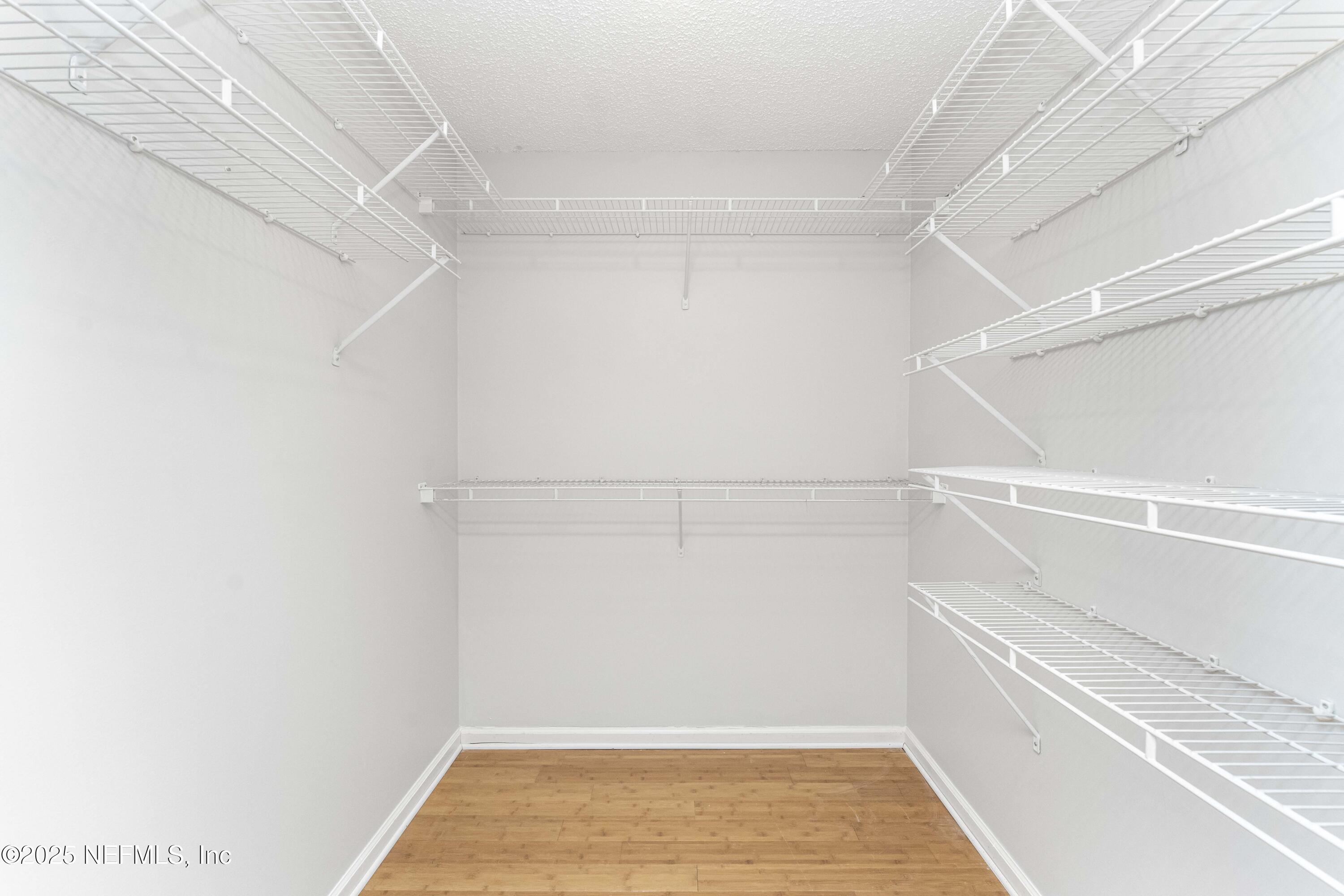 372 4th Street Atlantic Beach, FL 32233 - Photo 35 of 77 a view of an empty walk in closet