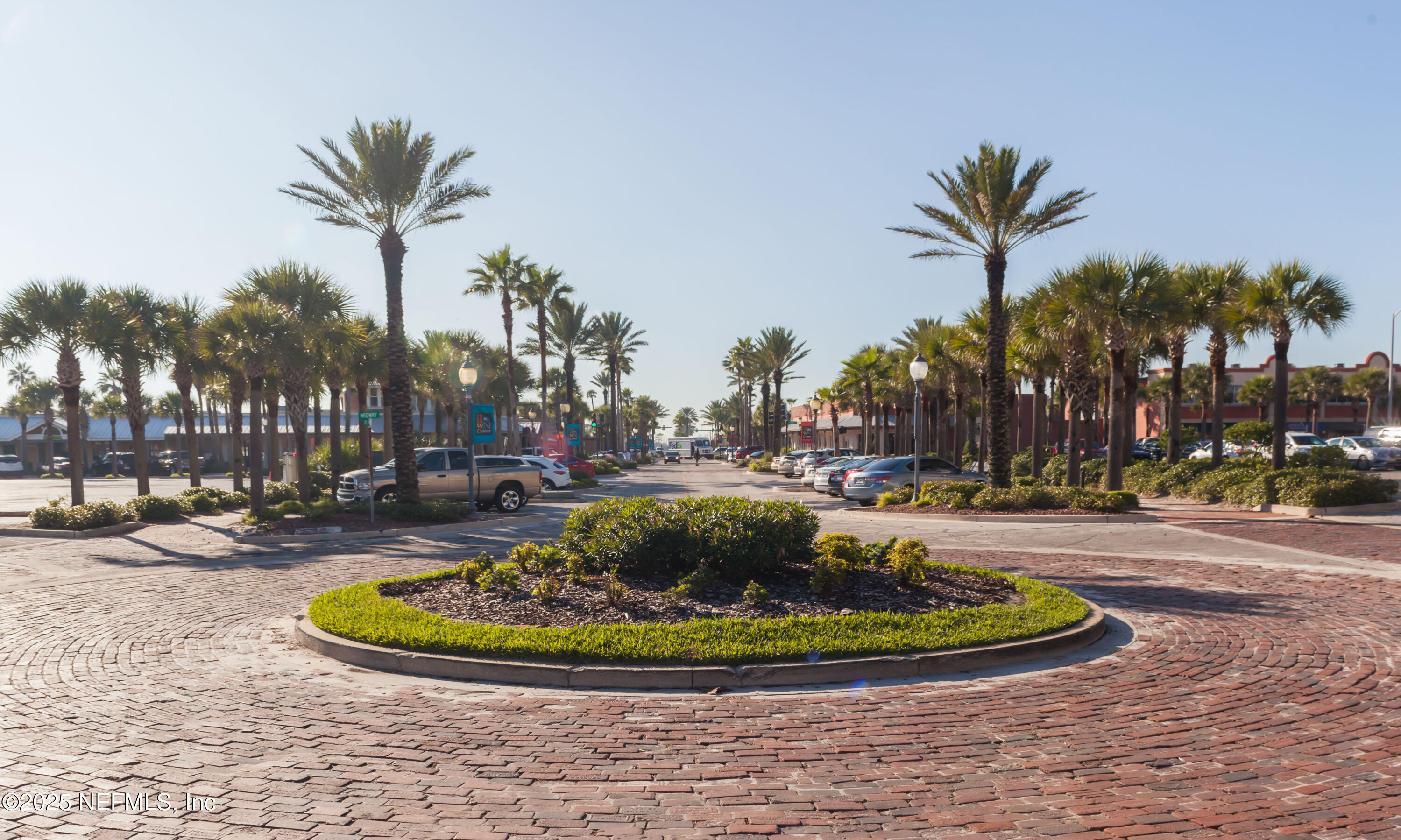 372 4th Street Atlantic Beach, FL 32233 - Photo 57 of 77 a view of a swimming pool with a fountain and plants