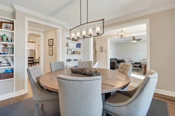 a view of an empty room with a fan