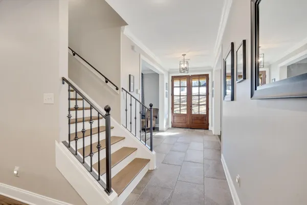 a view of a house with snow on the background