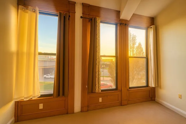 a view of an empty room and window