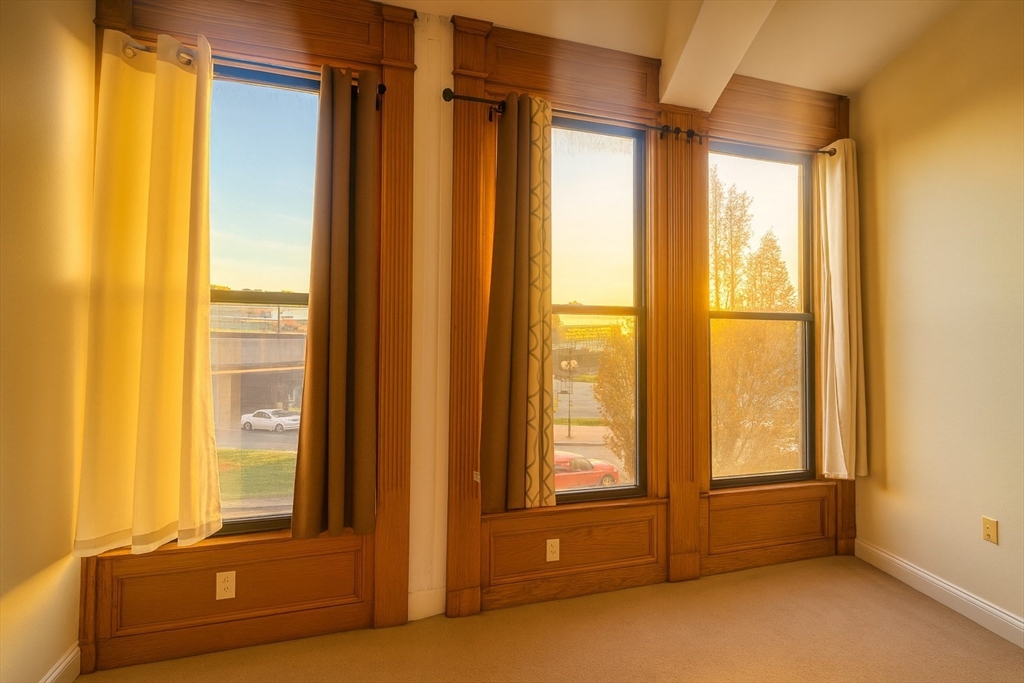 7 Central Square, Unit 203 Lynn, MA 01901 - Photo 6 of 10 a view of an empty room and window