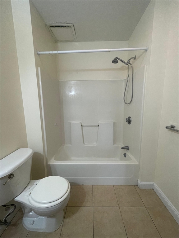 7 Central Square, Unit 203 Lynn, MA 01901 - Photo 8 of 10 a bathroom with a toilet and shower