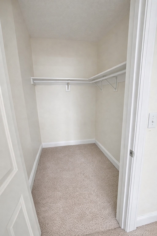 7 Central Square, Unit 203 Lynn, MA 01901 - Photo 9 of 13 a view of a room with empty racks