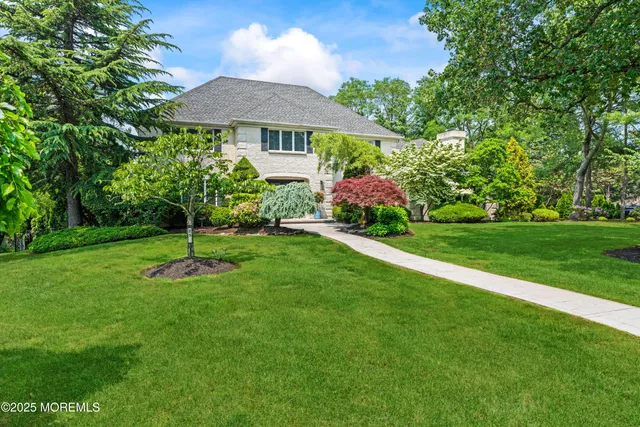 a kitchen with stainless steel appliances granite countertop a stove and a sink