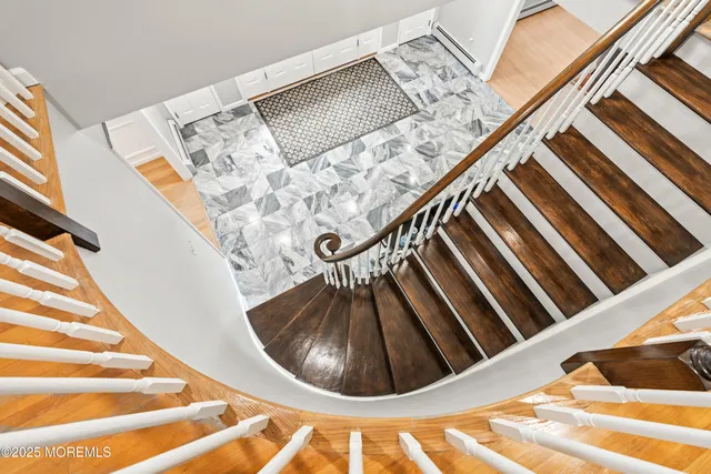 a spacious bedroom with a bed and a desk