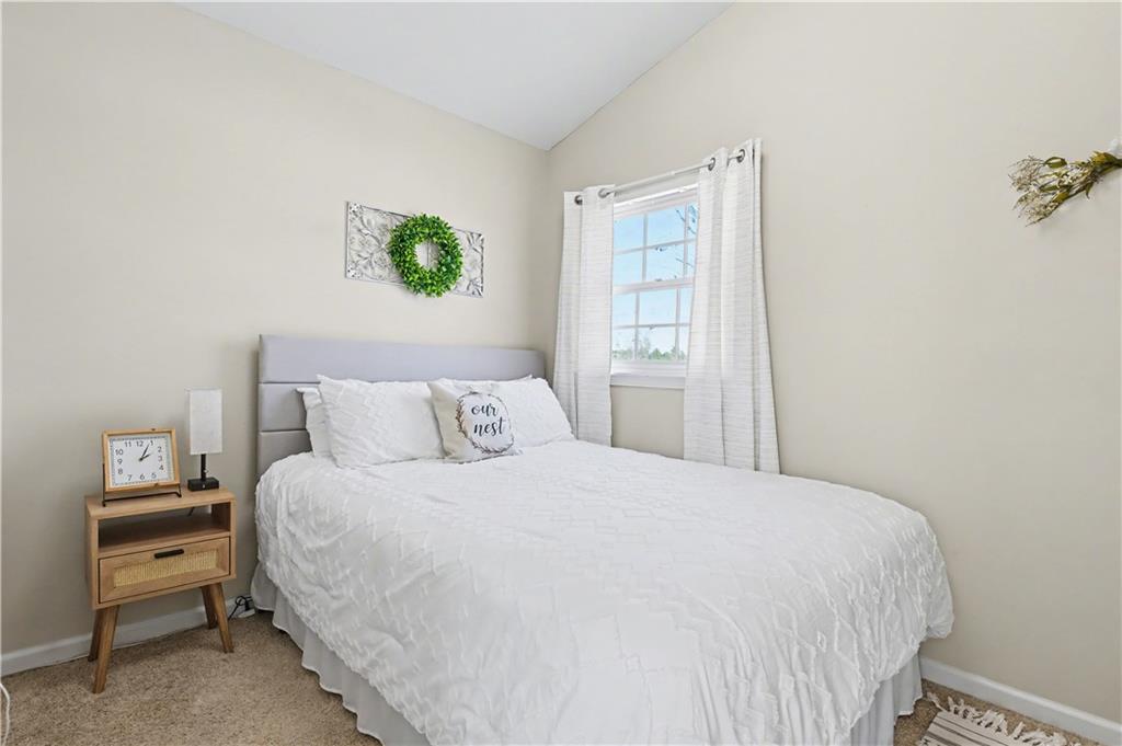 1833 Tom Odum Road Vidalia, GA 30474 - Photo 48 of 59 a bedroom with a bed and a window