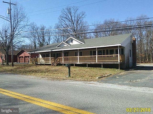 13028 Oliver Beach Road Baltimore, MD 21220 - Photo 1 of 21 a view of a house with a backyard and balcony