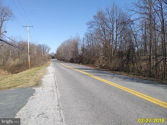 13028 Oliver Beach Road Baltimore, MD 21220 - Photo 2 of 21 a view of a road with a building in the background
