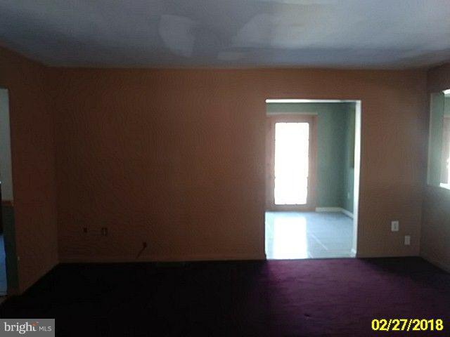 13028 Oliver Beach Road Baltimore, MD 21220 - Photo 12 of 21 a view of empty room with window