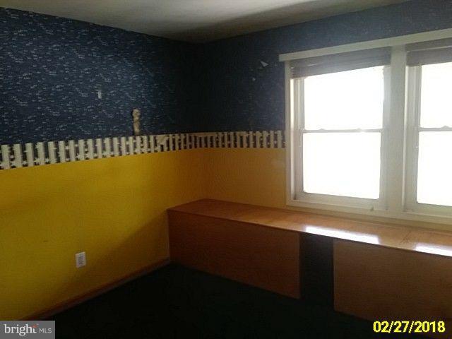 13028 Oliver Beach Road Baltimore, MD 21220 - Photo 15 of 21 a view of a room with a window