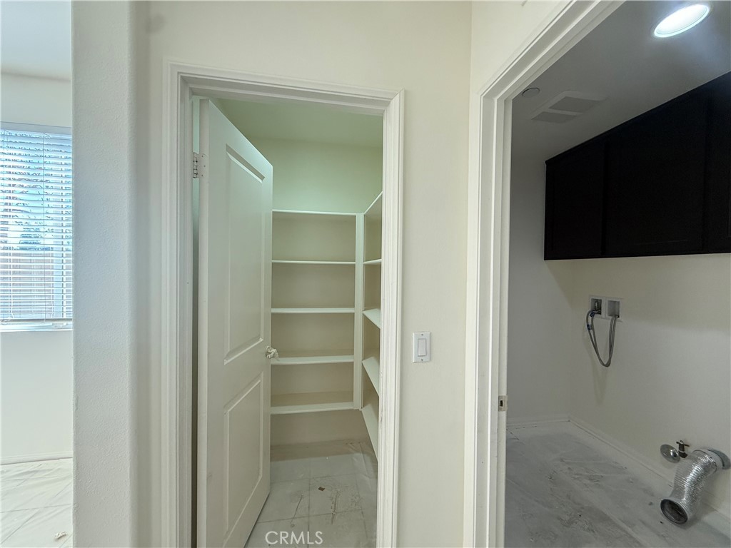 12319 Twin Gables Drive Chino, CA 91710 - Photo 16 of 42 a view of a bathroom with a flat screen tv