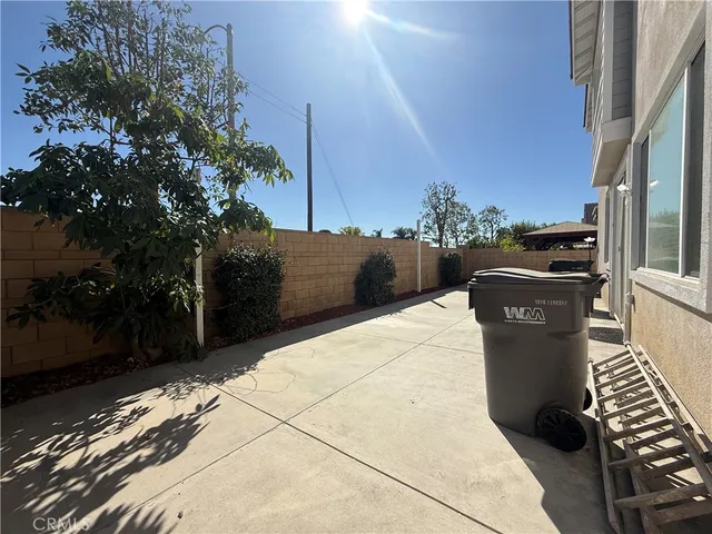 a view of a balcony with chairs