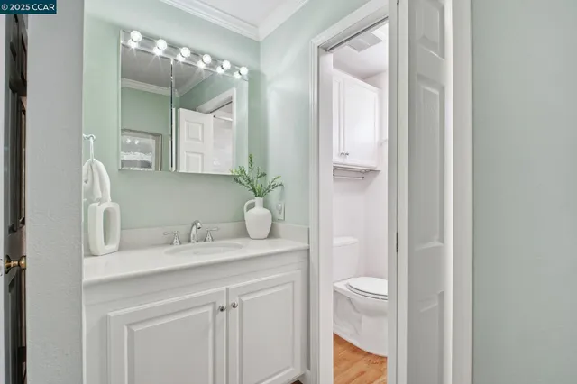 a view of an outdoor dining space with a table and chairs