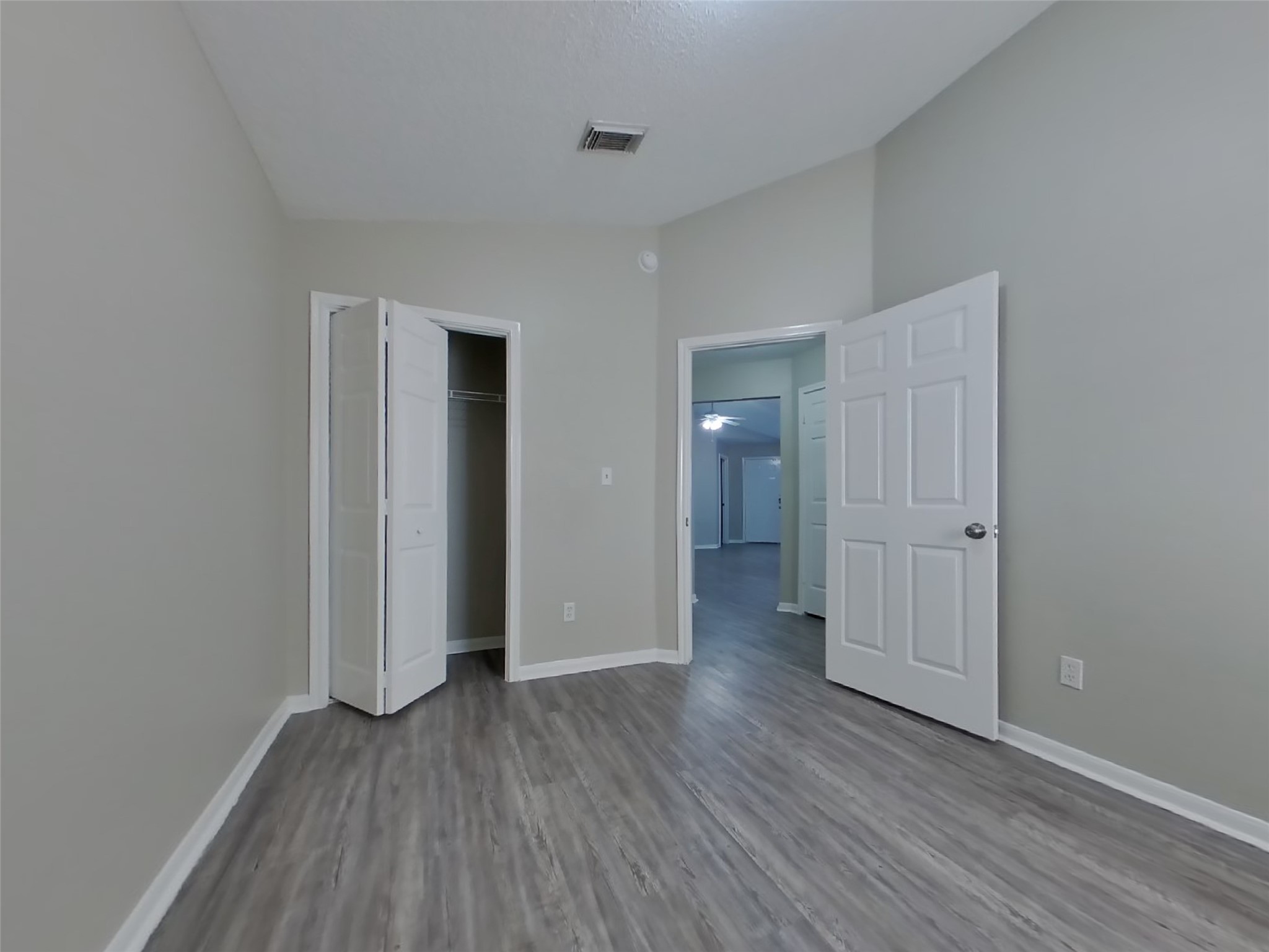 3151 Kelling Street Houston, TX 77045 - Photo 12 of 16 an empty room with wooden floor and closet