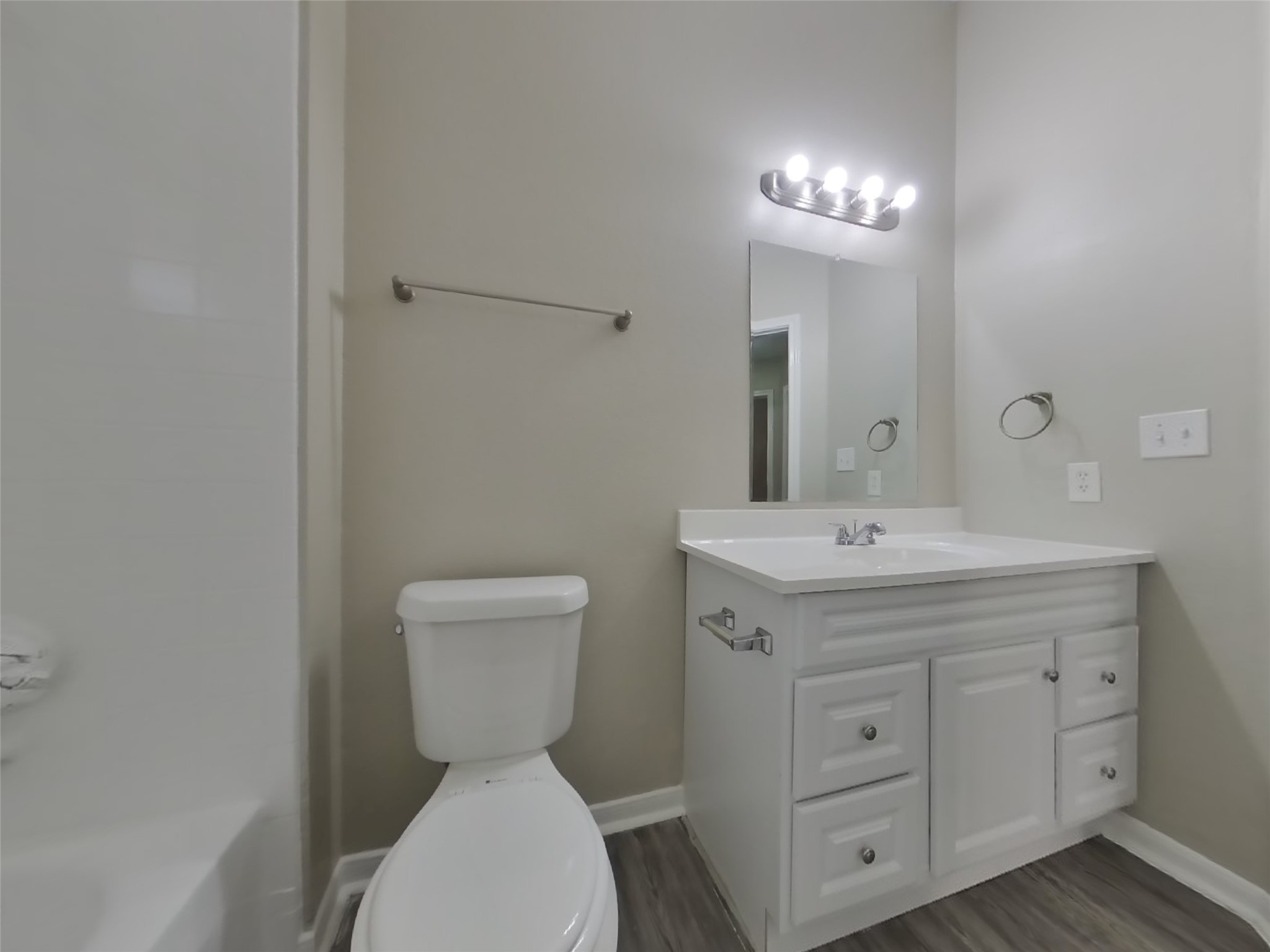 3151 Kelling Street Houston, TX 77045 - Photo 14 of 16 a bathroom with a toilet sink and mirror