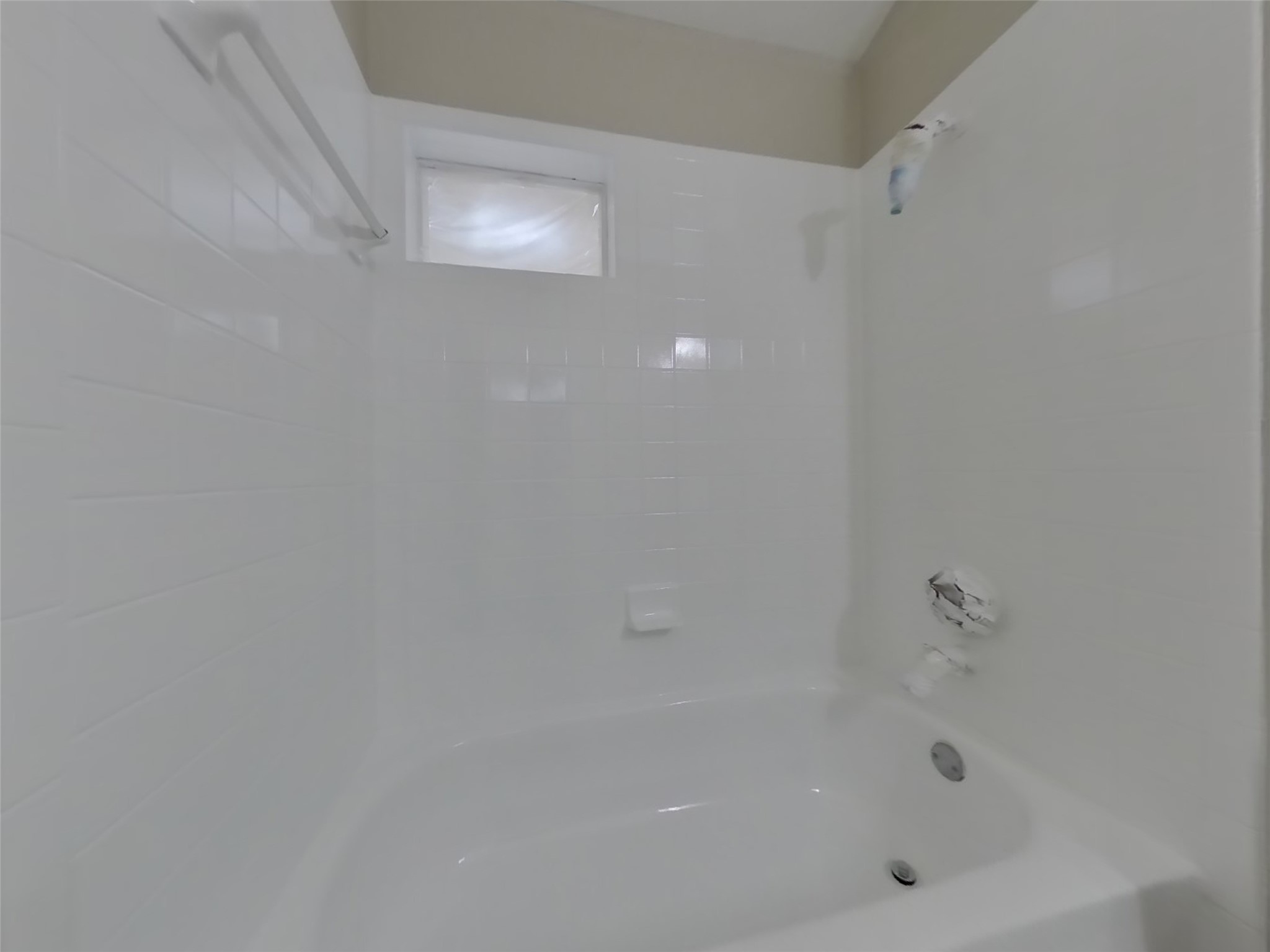 3151 Kelling Street Houston, TX 77045 - Photo 15 of 16 a close up of a bathtub