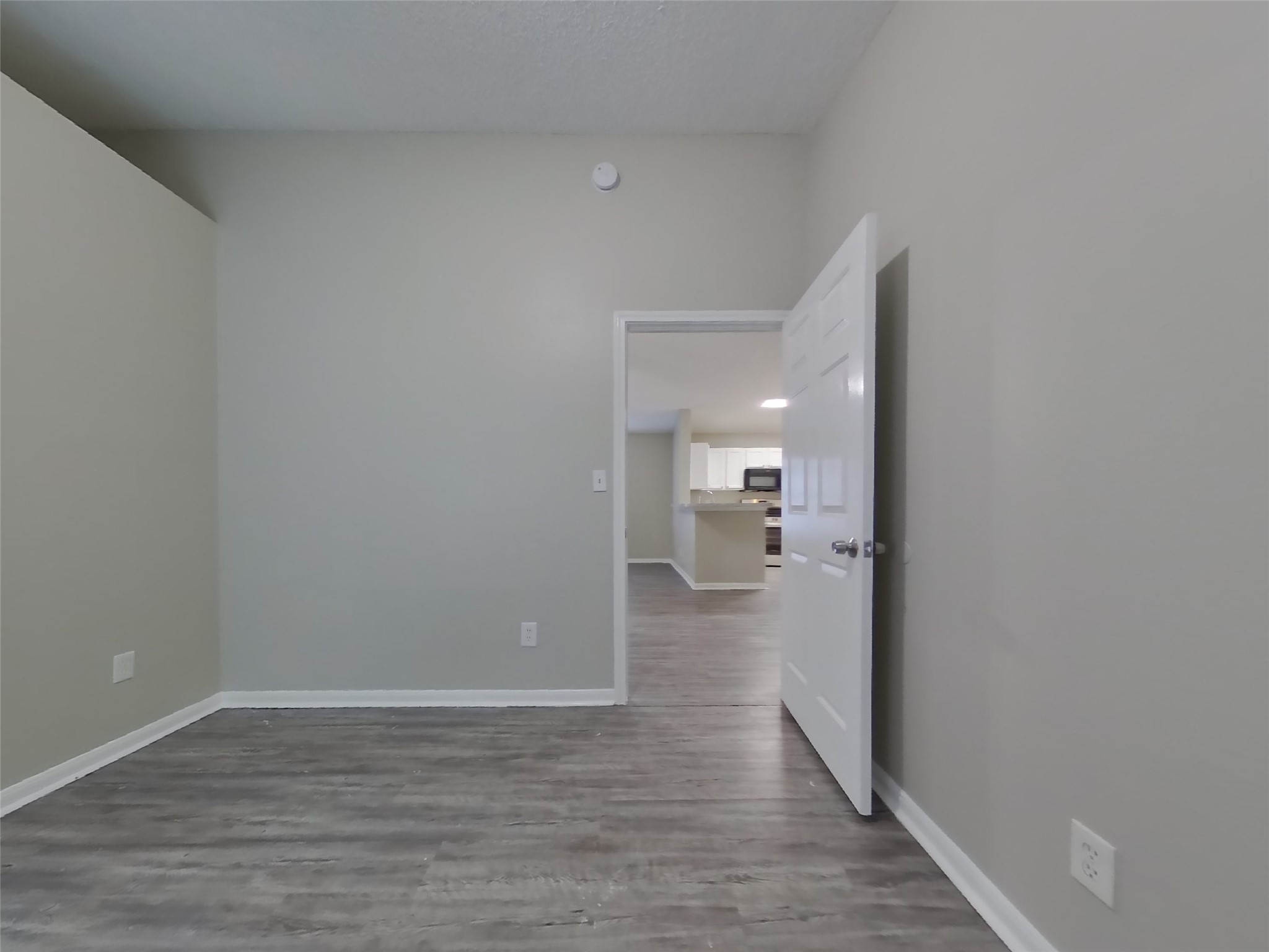 3151 Kelling Street Houston, TX 77045 - Photo 10 of 16 a view of a room with wooden floor