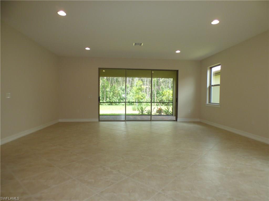 16325 Aberdeen Way Naples, FL 34110 - Photo 11 of 24 an empty room with a window