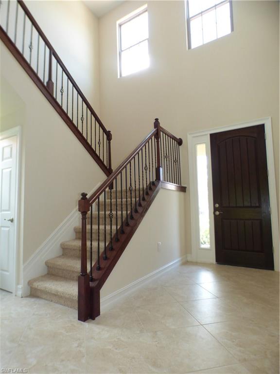 16325 Aberdeen Way Naples, FL 34110 - Photo 12 of 24 a view of entryway with stairs