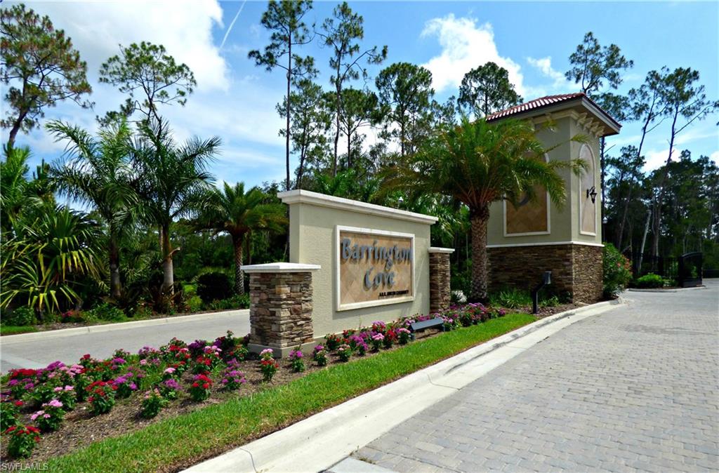 16325 Aberdeen Way Naples, FL 34110 - Photo 20 of 24 front view of house with a yard
