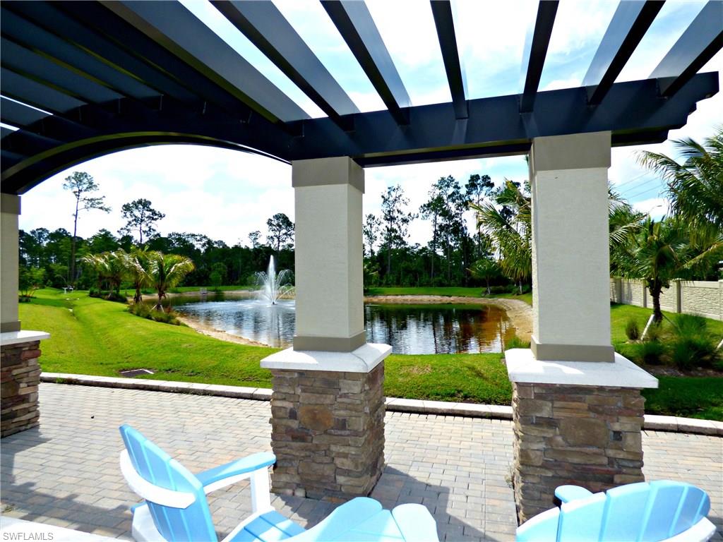 16325 Aberdeen Way Naples, FL 34110 - Photo 23 of 24 a view of swimming pool with a patio