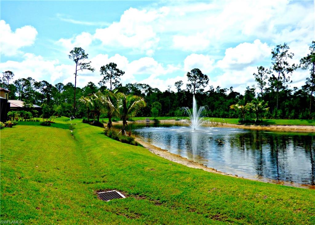 16325 Aberdeen Way Naples, FL 34110 - Photo 24 of 24 a view of a lake with a yard