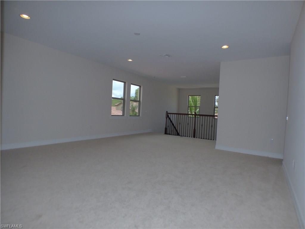 16325 Aberdeen Way Naples, FL 34110 - Photo 3 of 24 a view of wooden floor and windows in kitchen