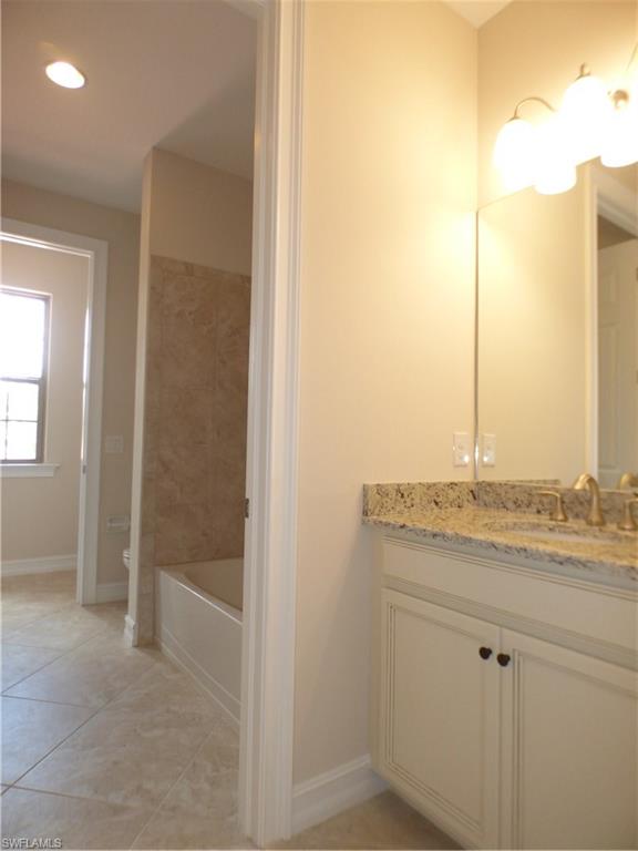 16325 Aberdeen Way Naples, FL 34110 - Photo 4 of 24 a view of a bathroom with a sink
