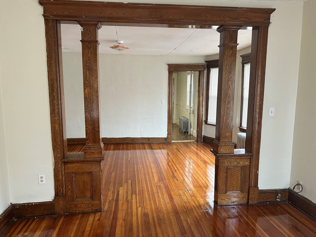 448 Dickinson Street, Unit 1R Springfield, MA 01108 - Photo 2 of 8 a view of front door with wooden floor