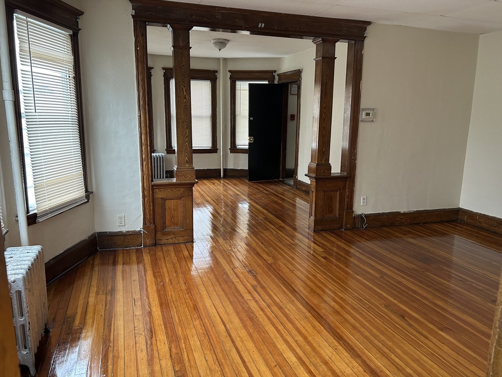 448 Dickinson Street, Unit 1R Springfield, MA 01108 - Photo 7 of 8 a view of outdoor space with wooden floor and windows