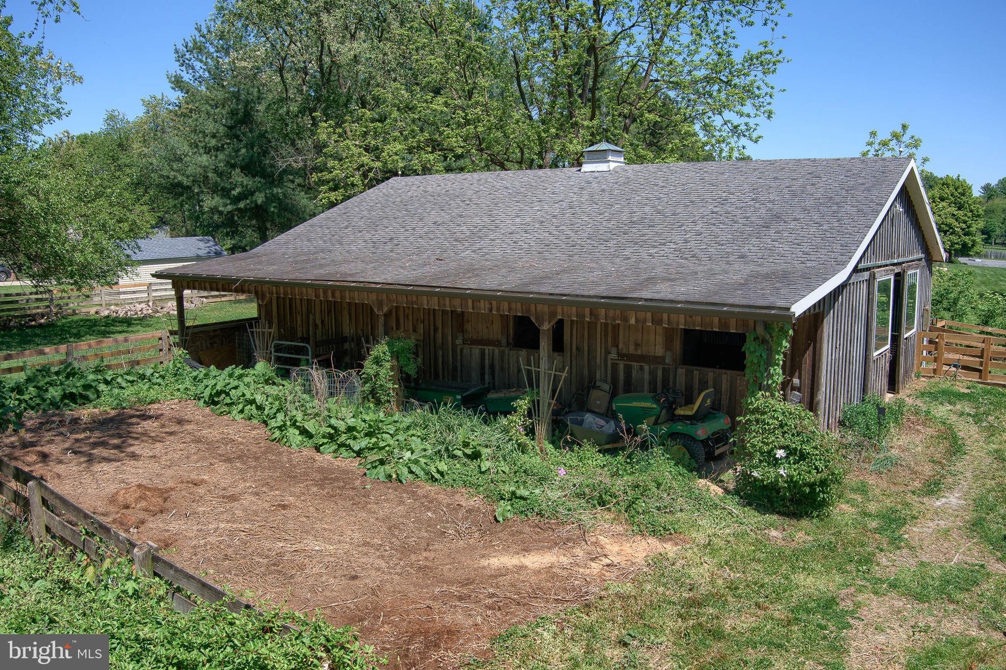 19000 Muncaster Road Derwood, MD 20855 - Photo 41 of 83 Large vegetable garden on the side of the barn