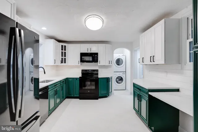 a kitchen with a sink and a stove
