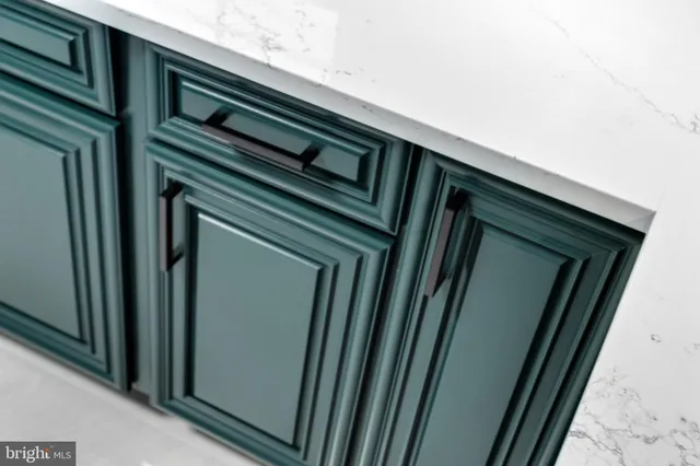 a bathroom with a sink window and a mirror