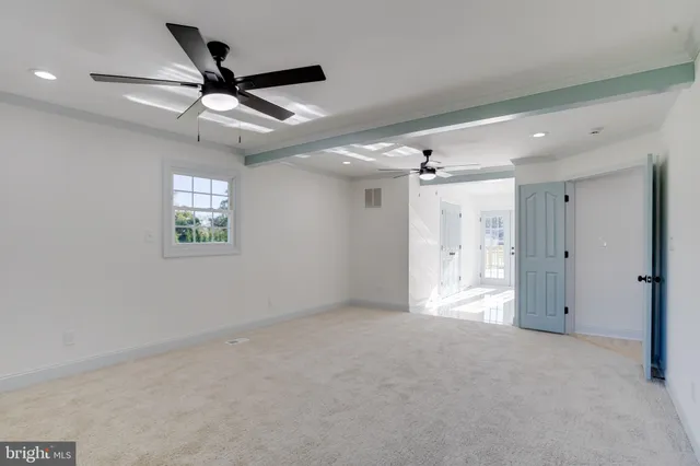 a bathroom with a shower and a sink