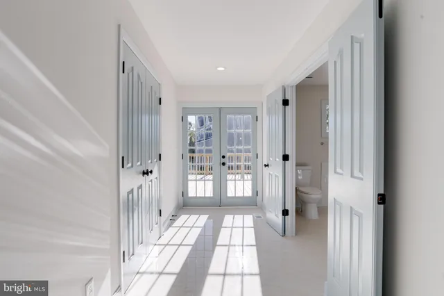 a bathroom with a sink a mirror and a shower