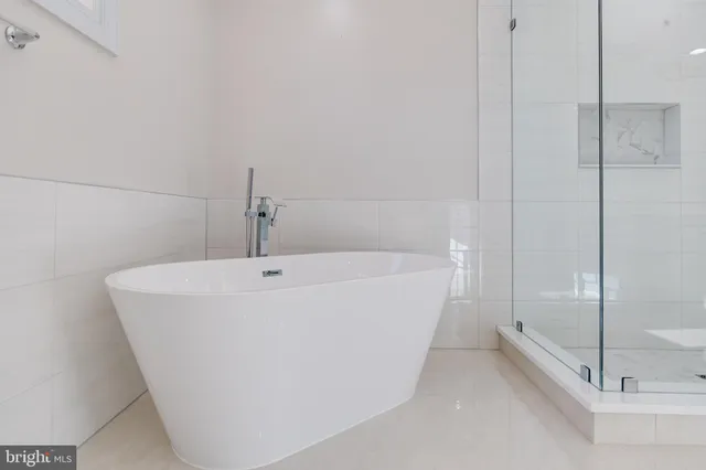 a bathroom with a sink vanity and a mirror