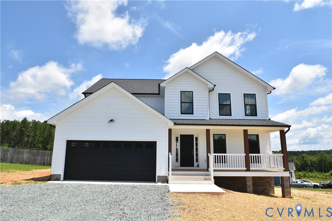Modern farmhouse style home with covered porch, gr