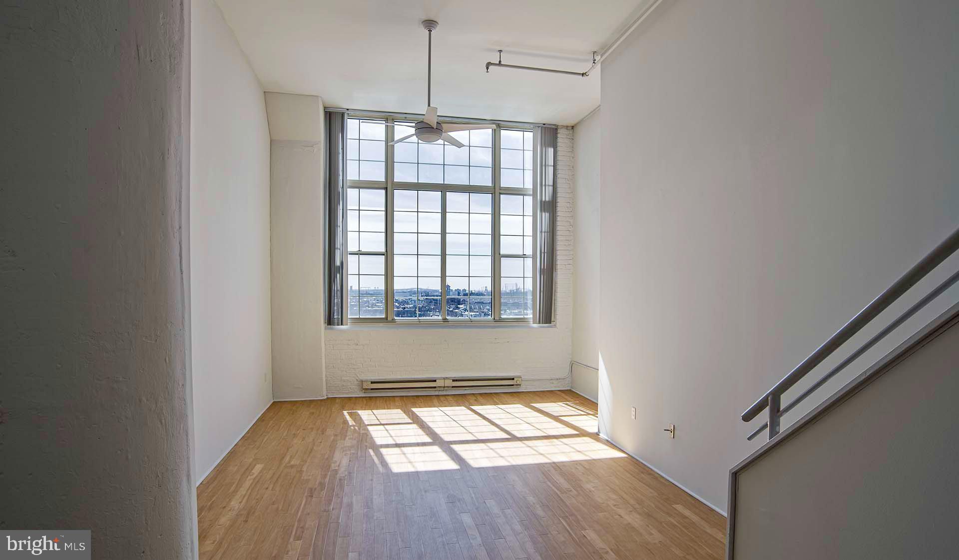 2300 Walnut Street, Unit 0B521 Philadelphia, PA 19103 - Photo 24 of 28 a view of empty room with wooden floor and fan