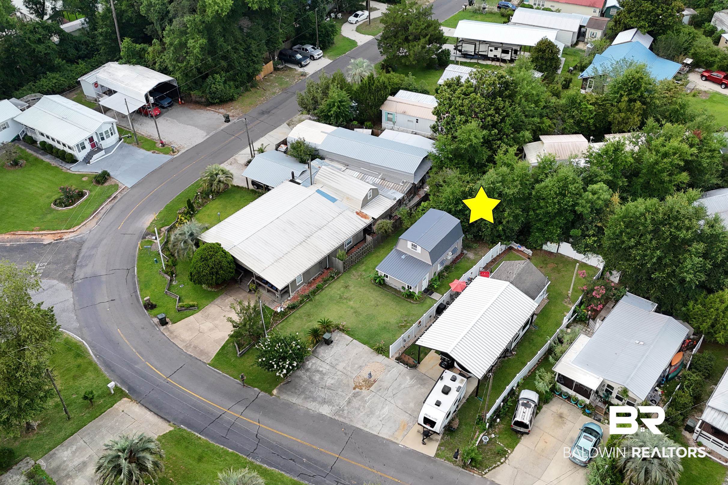 496 Elberta Loop Lillian, AL 36549 - Photo 23 of 29 Aerial perspective of suburban area
