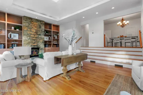 a bedroom with bed and a table