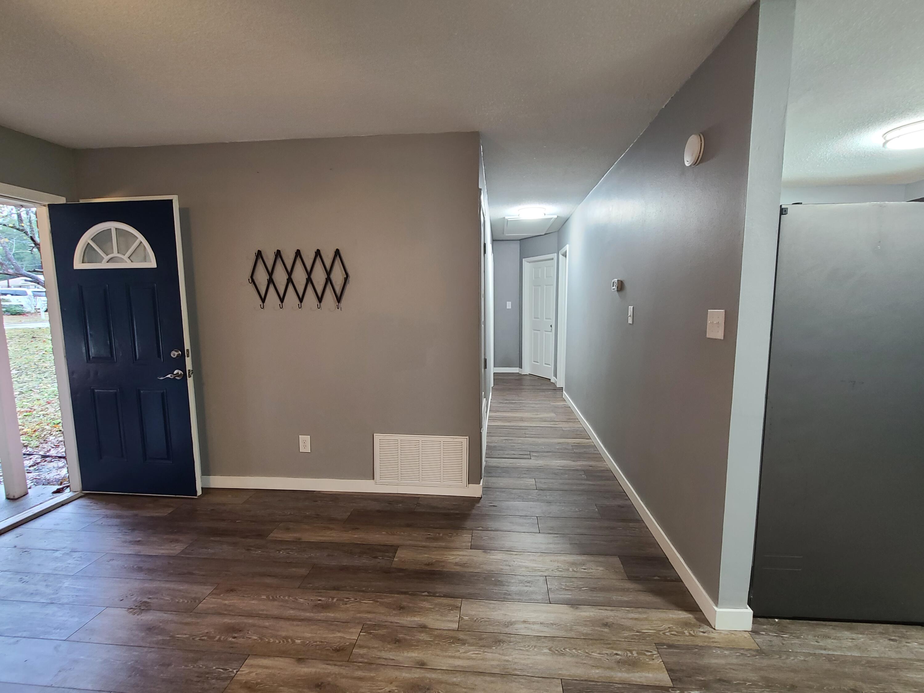 101 Blaylock Street Crestview, FL 32539 - Photo 4 of 21 LIving and Hallway