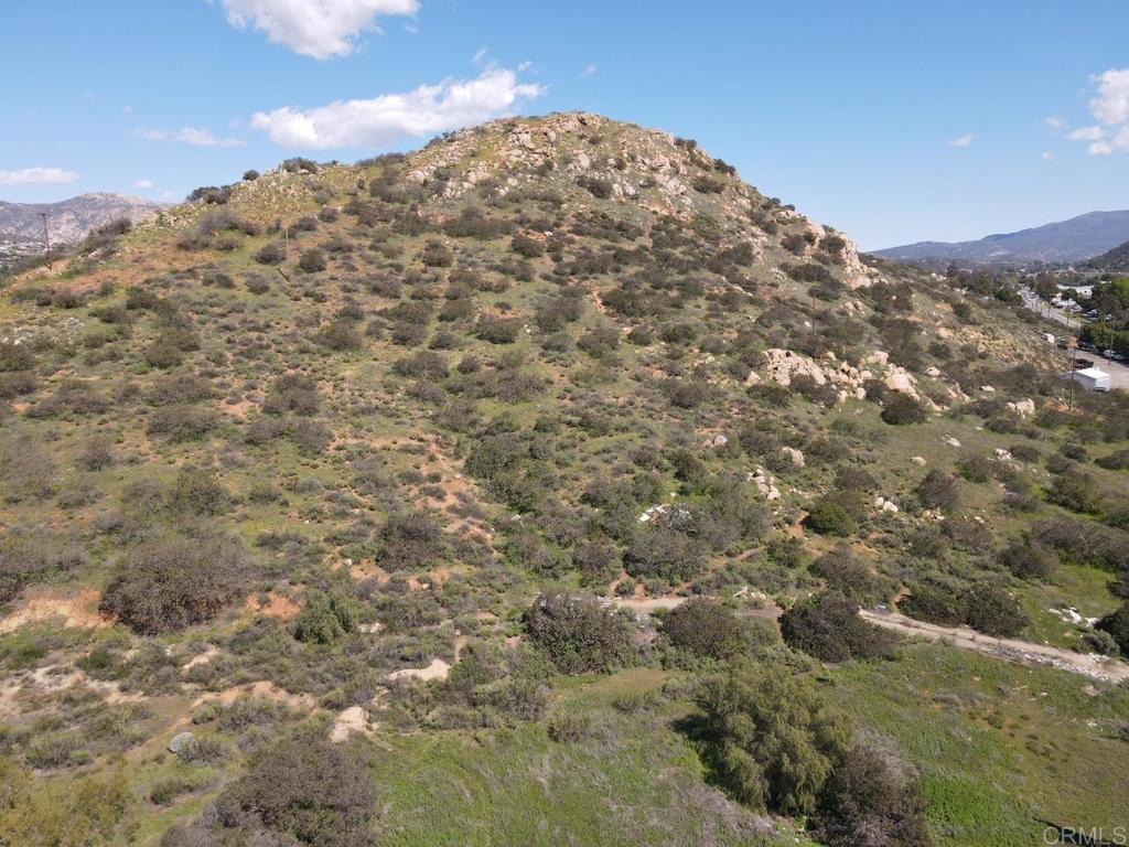 0 Oak Creek Road El Cajon, CA 92021 - Photo 7 of 32 a view of a large building with mountains in the background