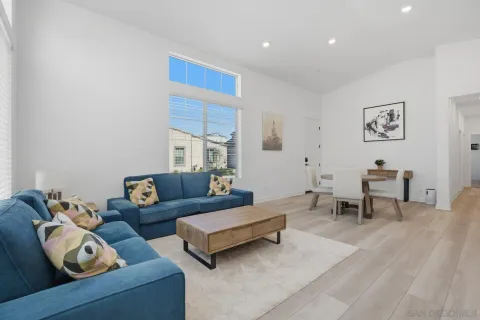 a living room with furniture and a couch