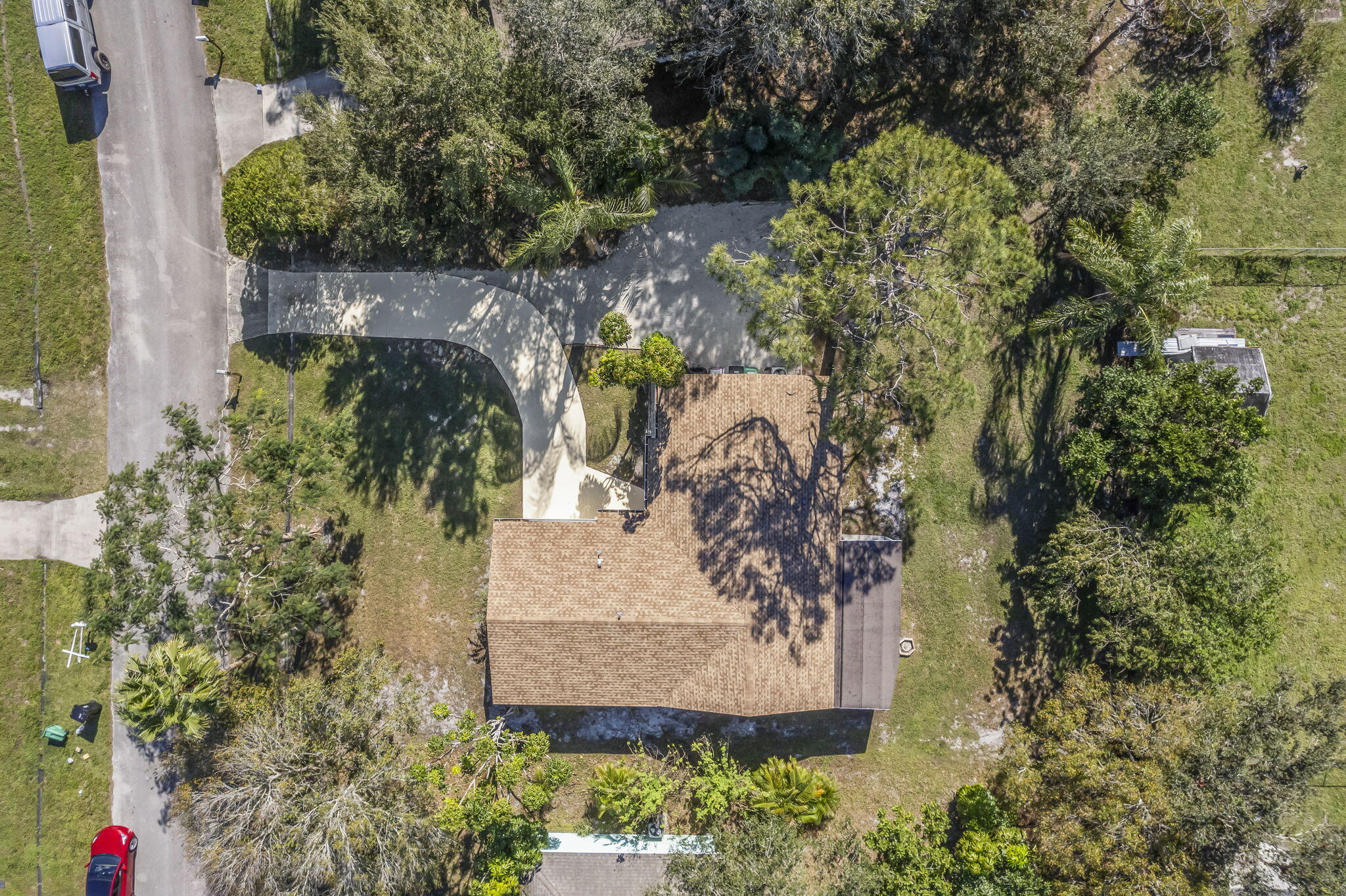 333 Southwest Kentwood Road Port St. Lucie, FL 34953 - Photo 21 of 22 an aerial view of a house with a yard