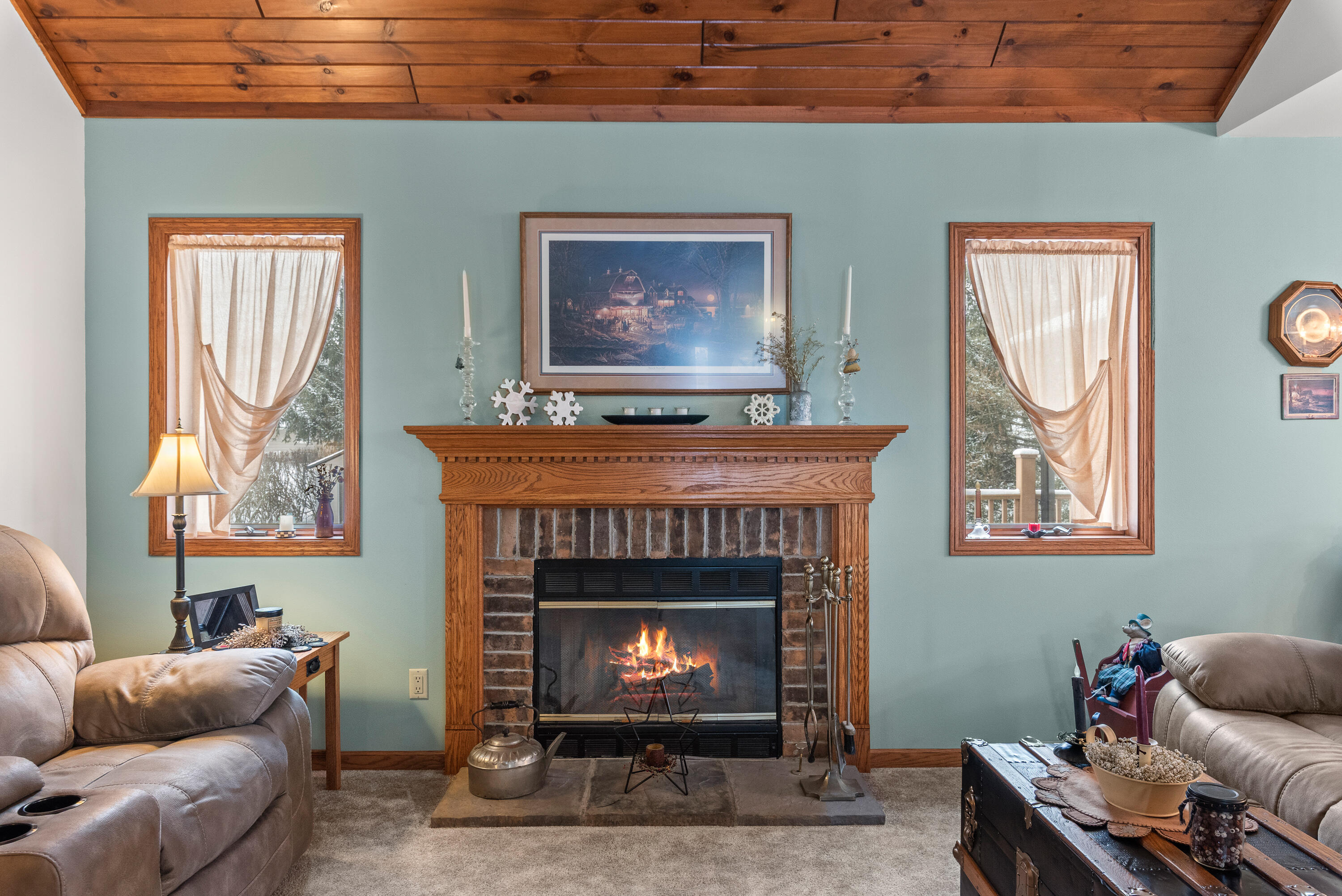 W1072 Hilltop Road Rubicon, WI 53078 - Photo 12 of 51 Gas fireplace with brick surround & wooden mantel