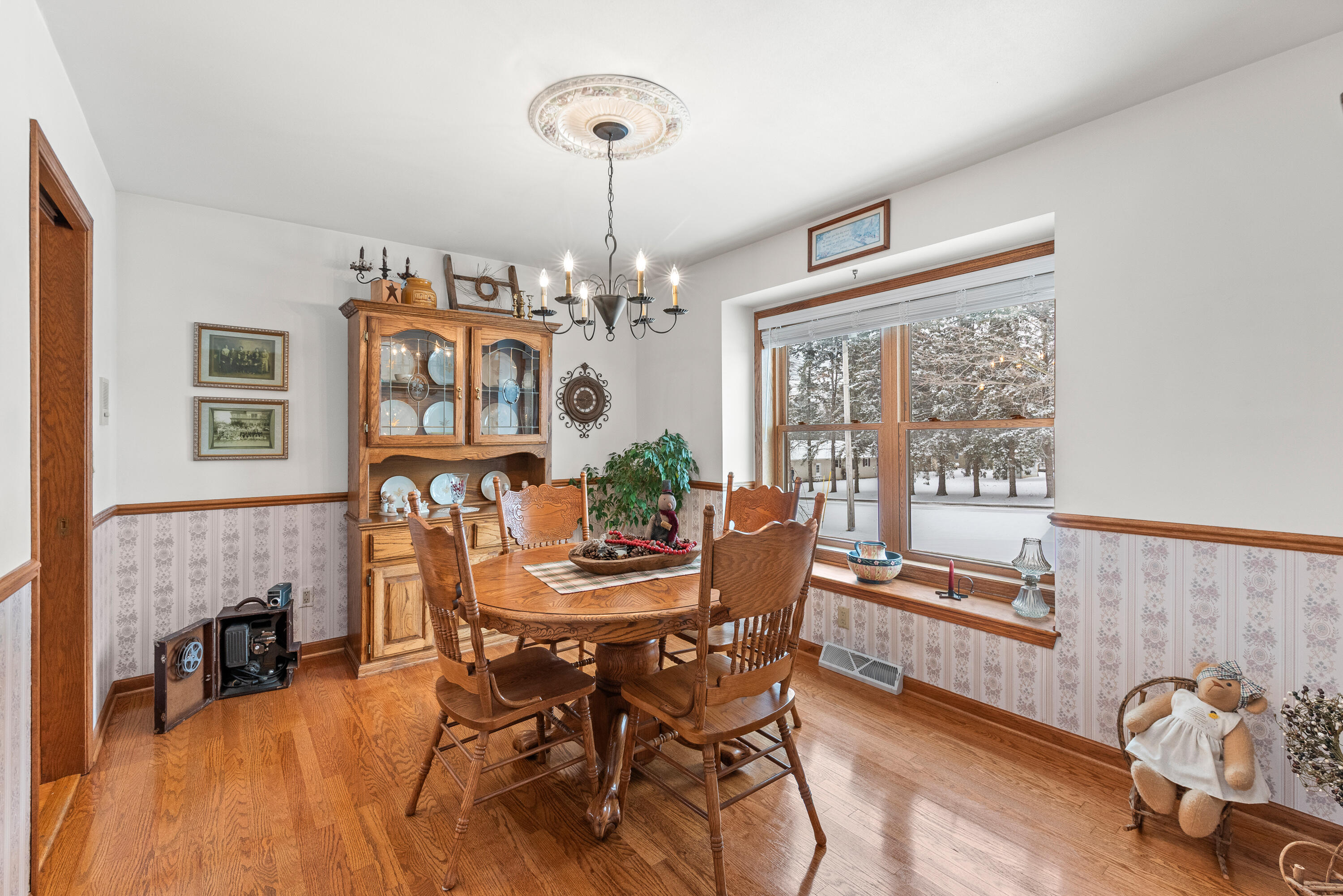 W1072 Hilltop Road Rubicon, WI 53078 - Photo 14 of 51 Great extra space on main floor. Currently used as formal dining Beautiful hard wood floors