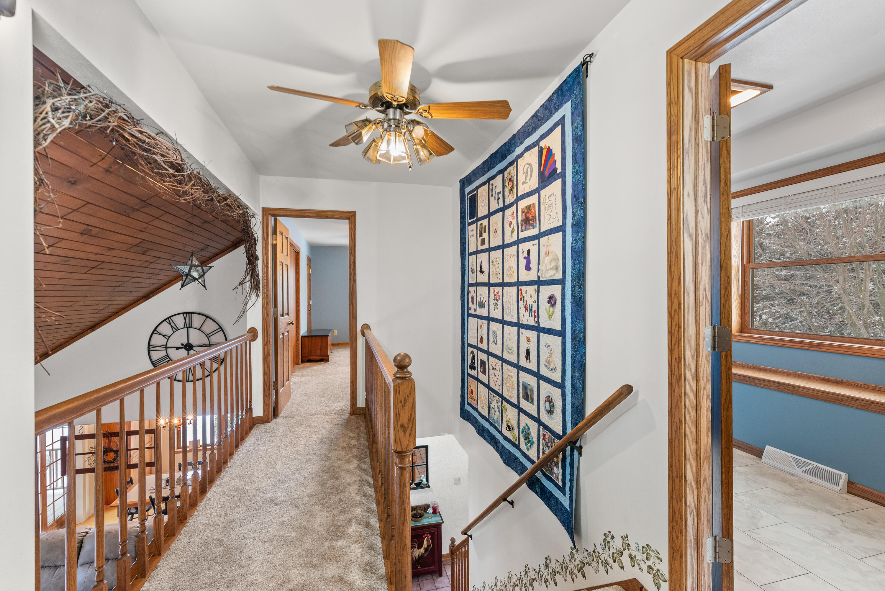 W1072 Hilltop Road Rubicon, WI 53078 - Photo 27 of 51 cat-walk hallway between both upper bedrooms.