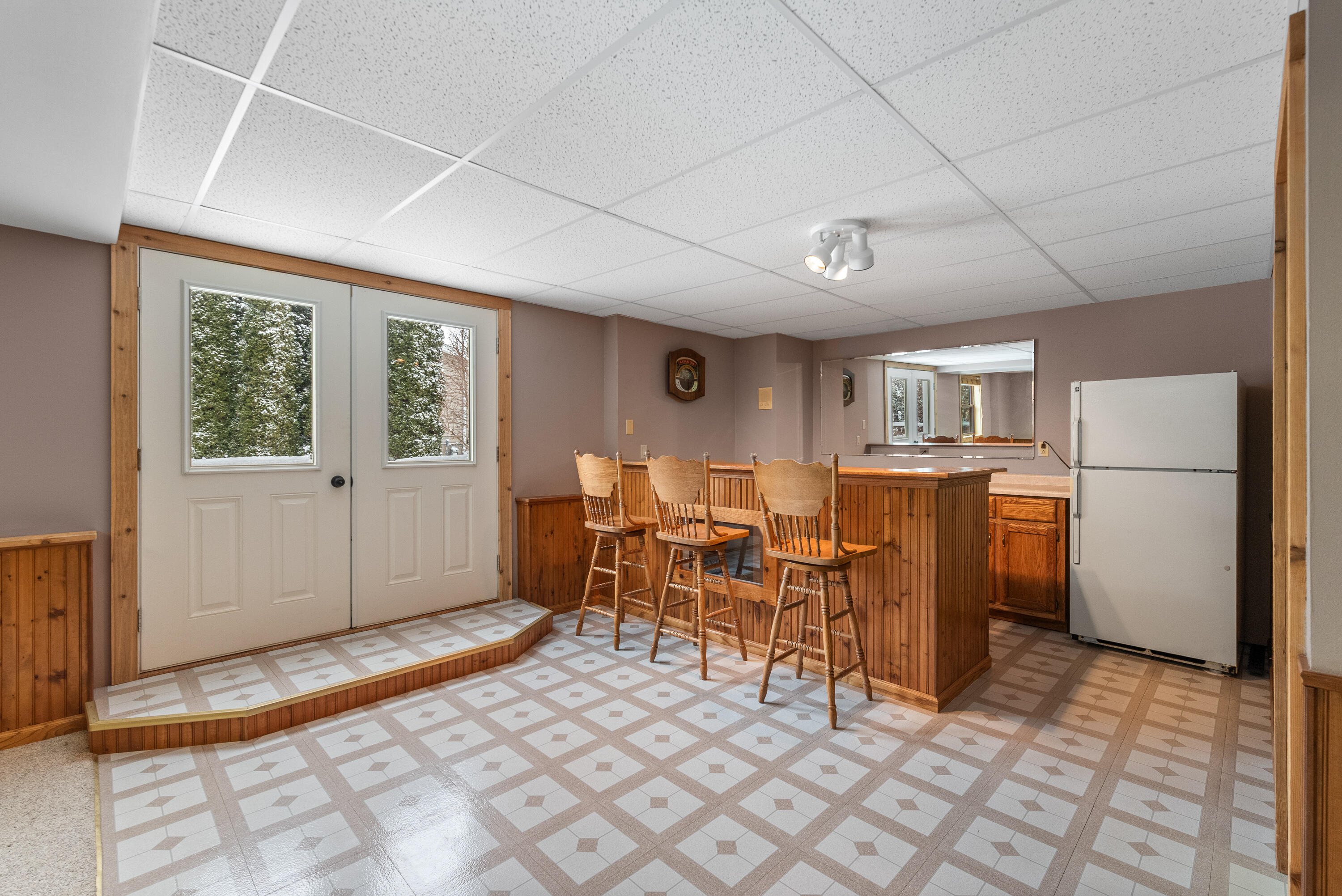 W1072 Hilltop Road Rubicon, WI 53078 - Photo 35 of 51 Lower level has full walk out outer doors with dual entry doors.