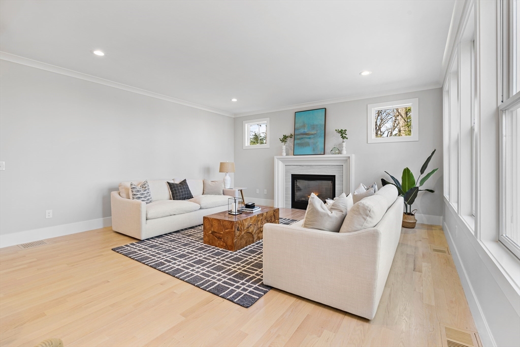 78 Morningside Road Needham, MA 02492 - Photo 11 of 38 a living room with furniture and a fireplace